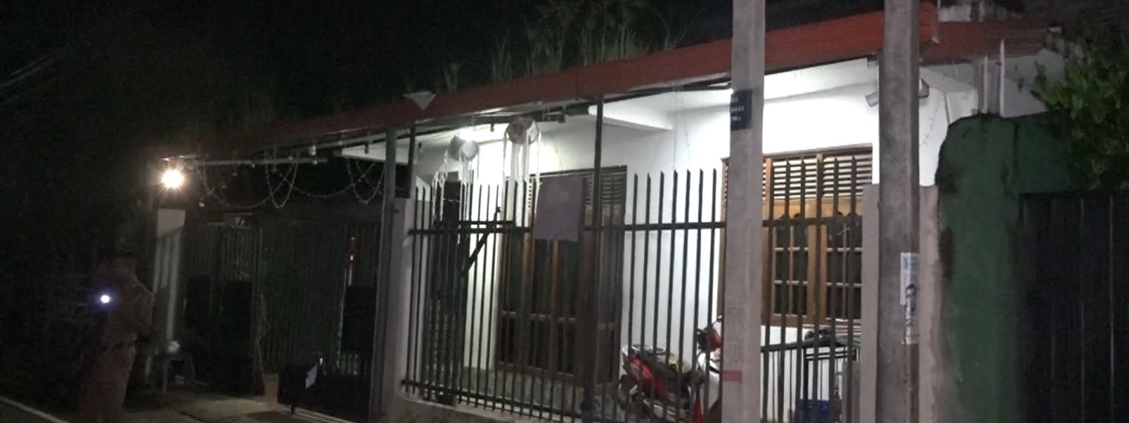 Shooting Targets House of Woman in Custody